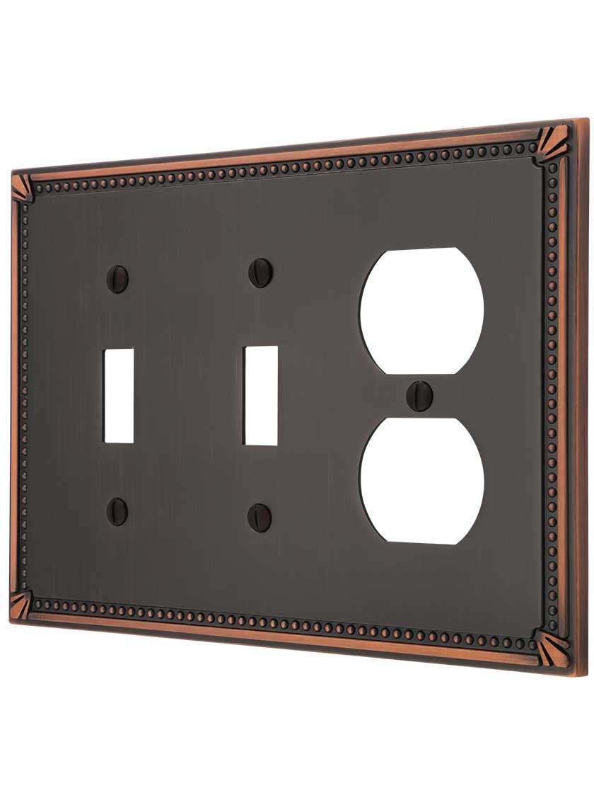 Imperial Bead Double Toggle/Duplex Combination Switch Plate in Aged Bronze.